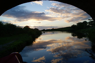 sunset under the canal bridge