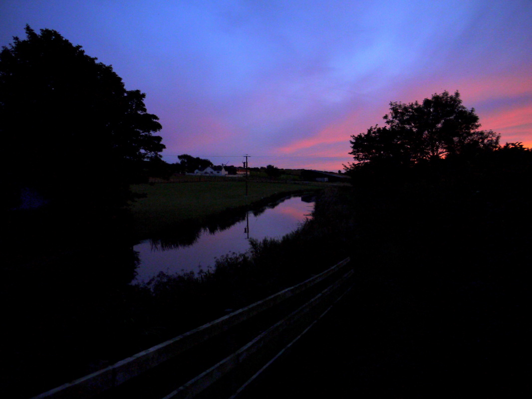 purple sunset canal reflections